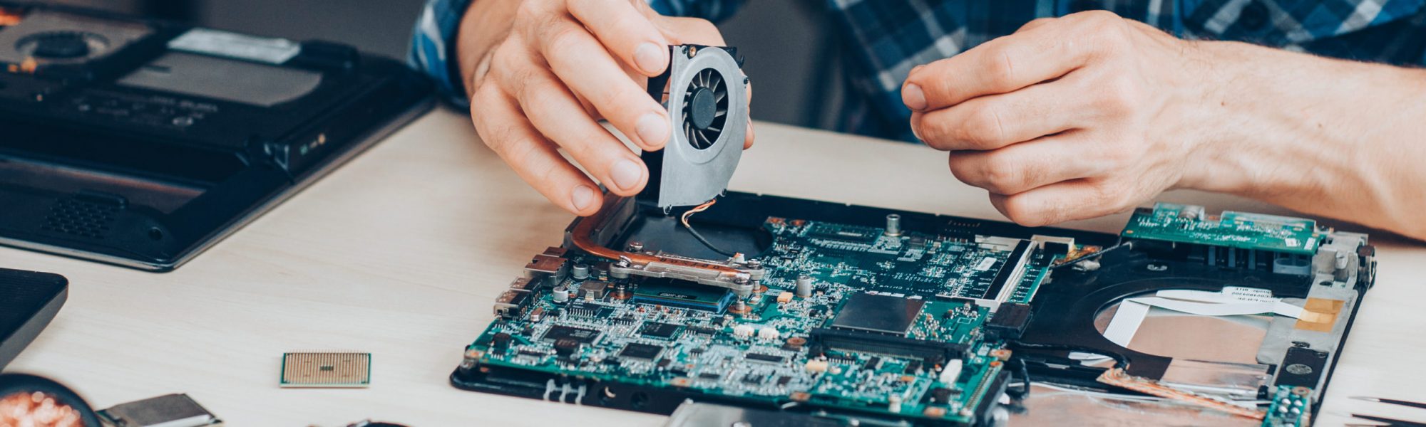 computer repair service hardware support laptop Computer repair service. Hardware support. Electronic technology. Cropped shot of technician fixing laptop cooler.